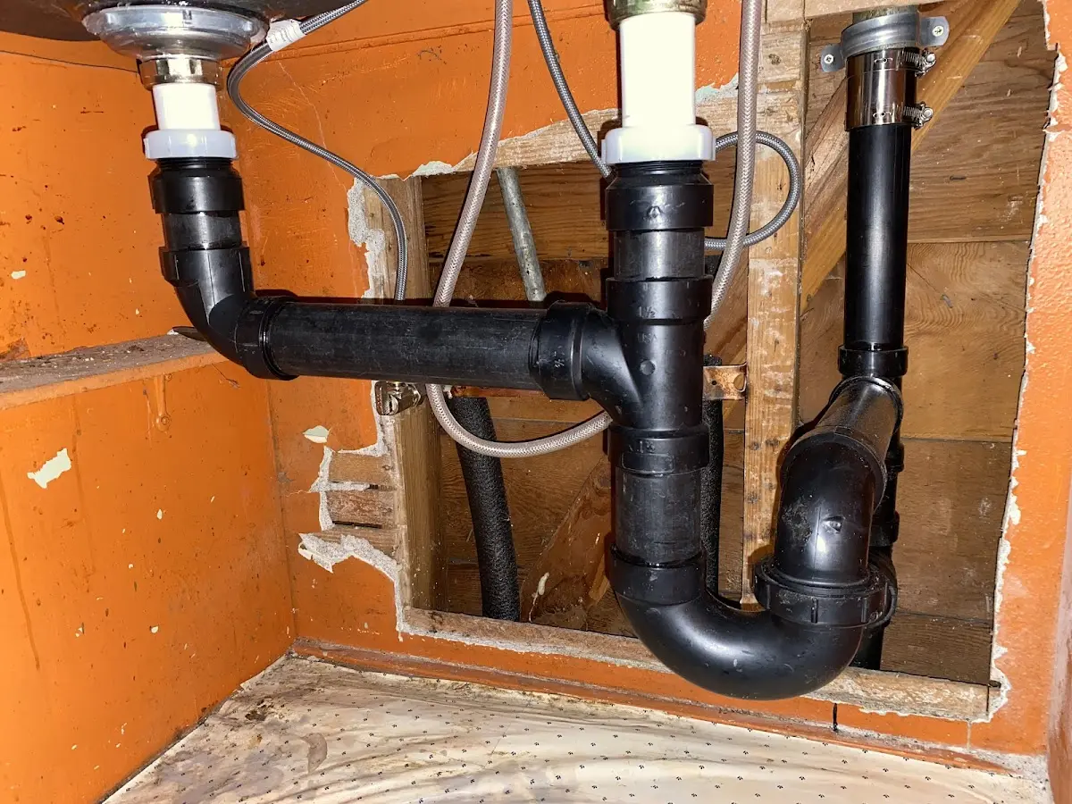 Professional Garbage Disposal Repair equipment and tools on the job in Shenango
